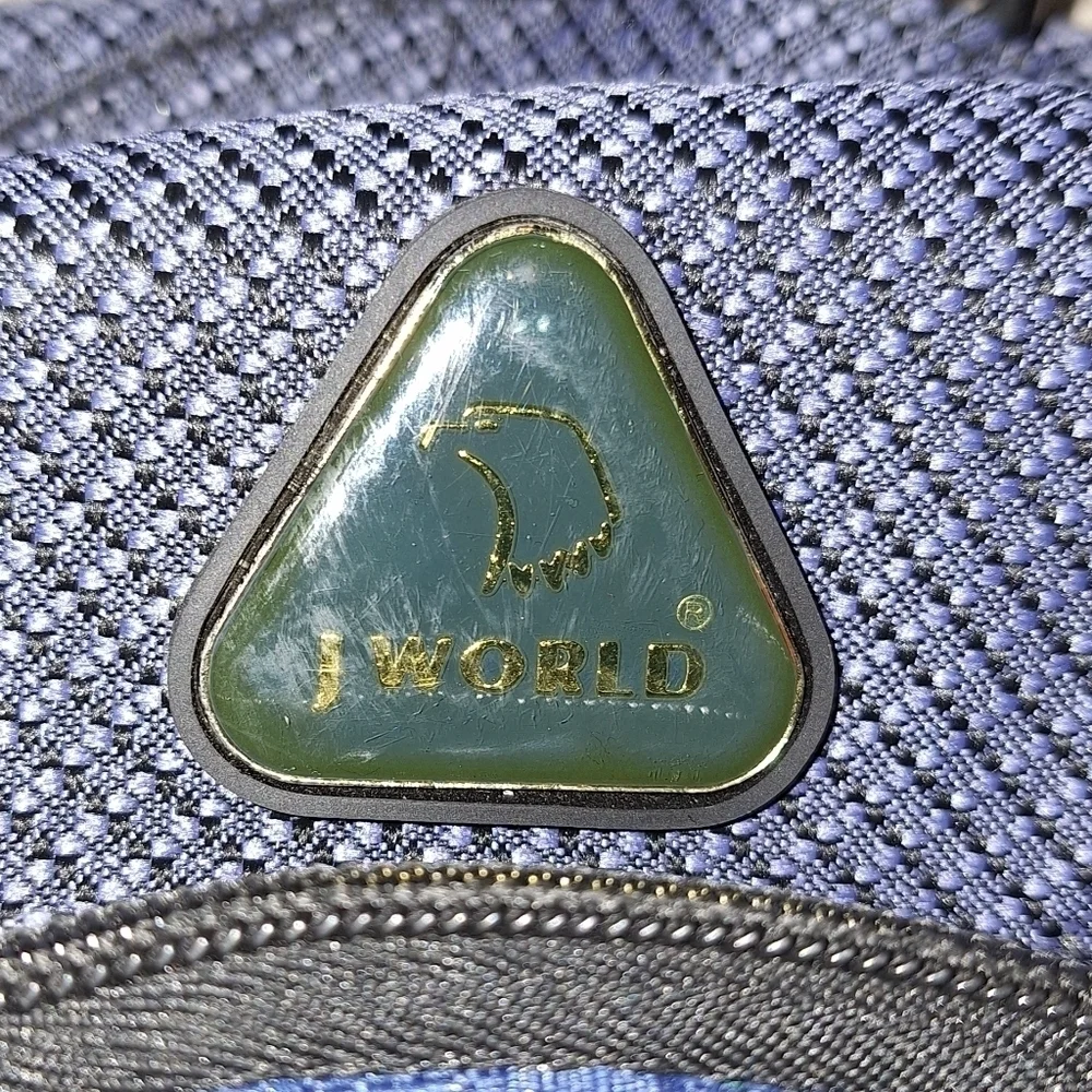 A J World backpack.  It's pre-owned but still in great condition.